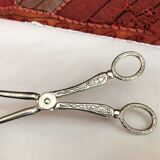 Wrought silver plated cake clips
