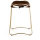 Contemporary kitchen stool in aged brass and dark brown leather.