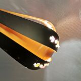 Hanging lamp in thin metal pieces, copper colored and black with prisms.