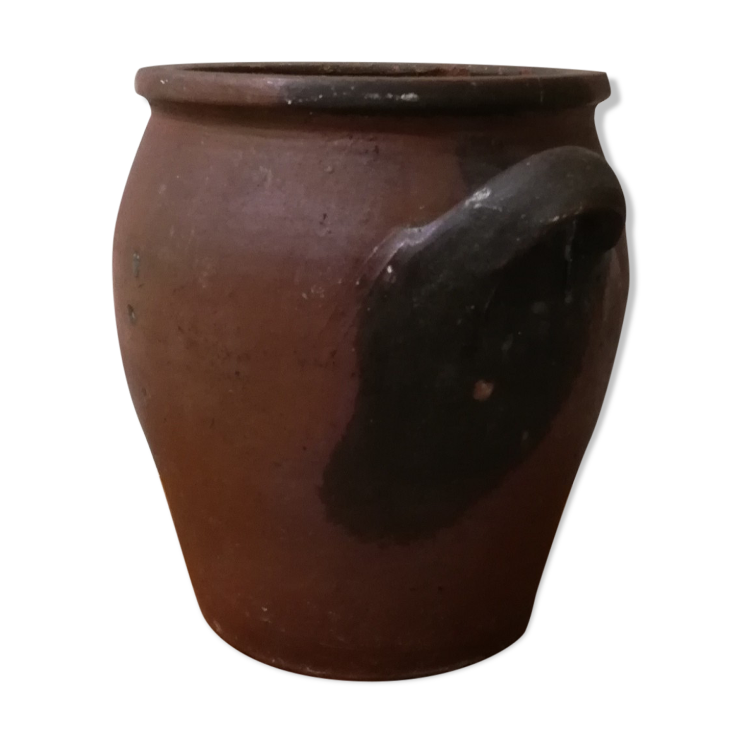 Old red and black terracotta grease pot