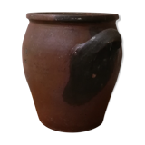 Old red and black terracotta grease pot