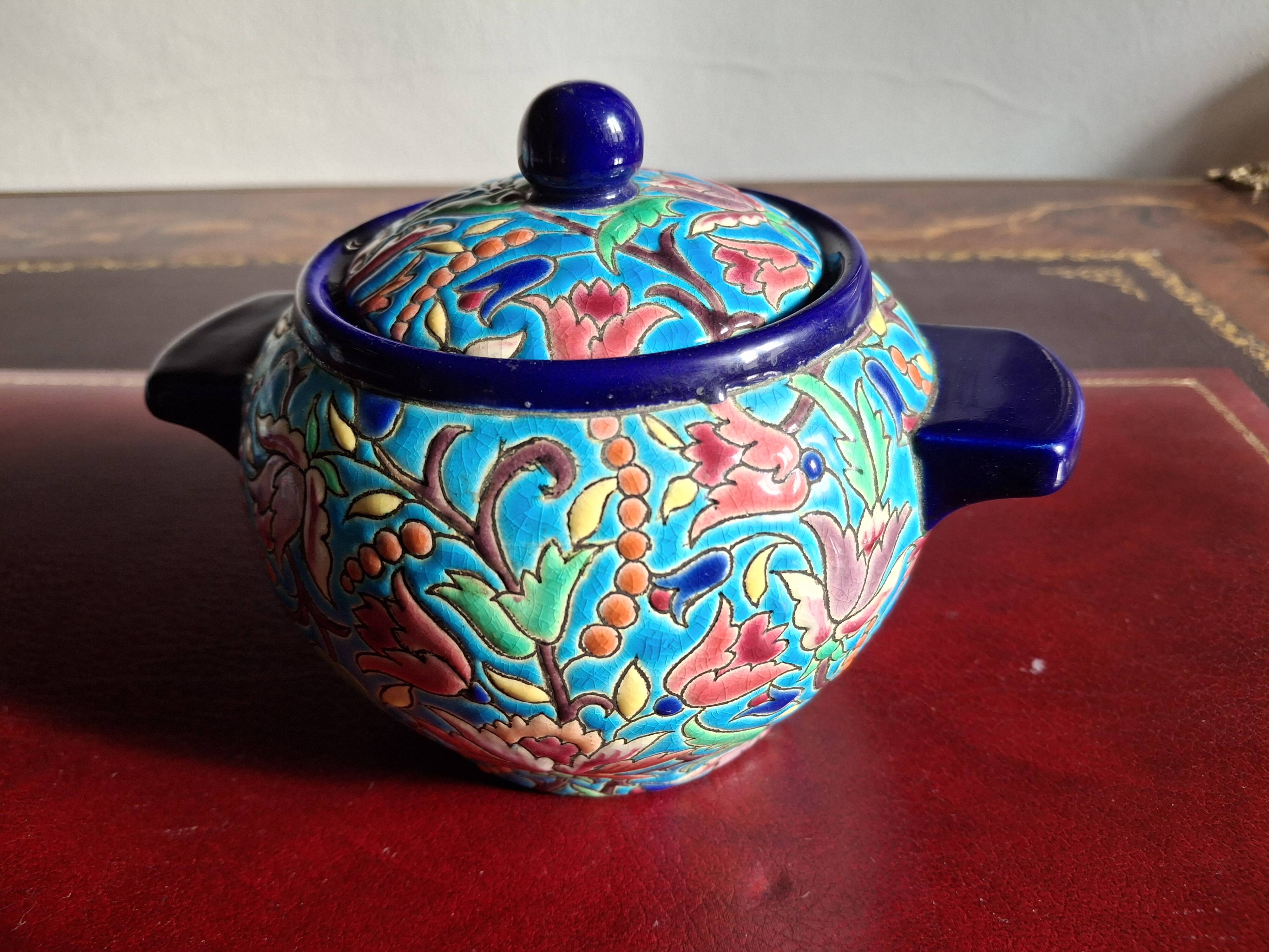 Cloisonné enamel tea service from Longwy in excellent condition.