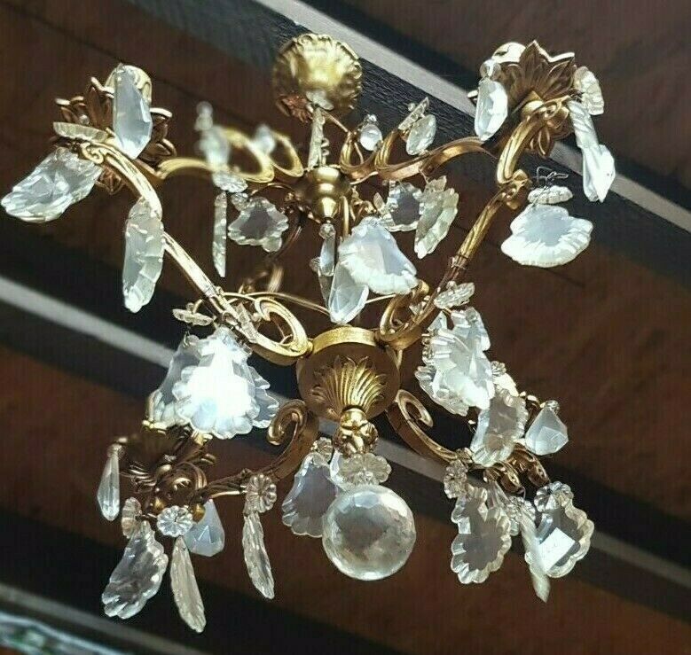 Bronze chandelier with stamps