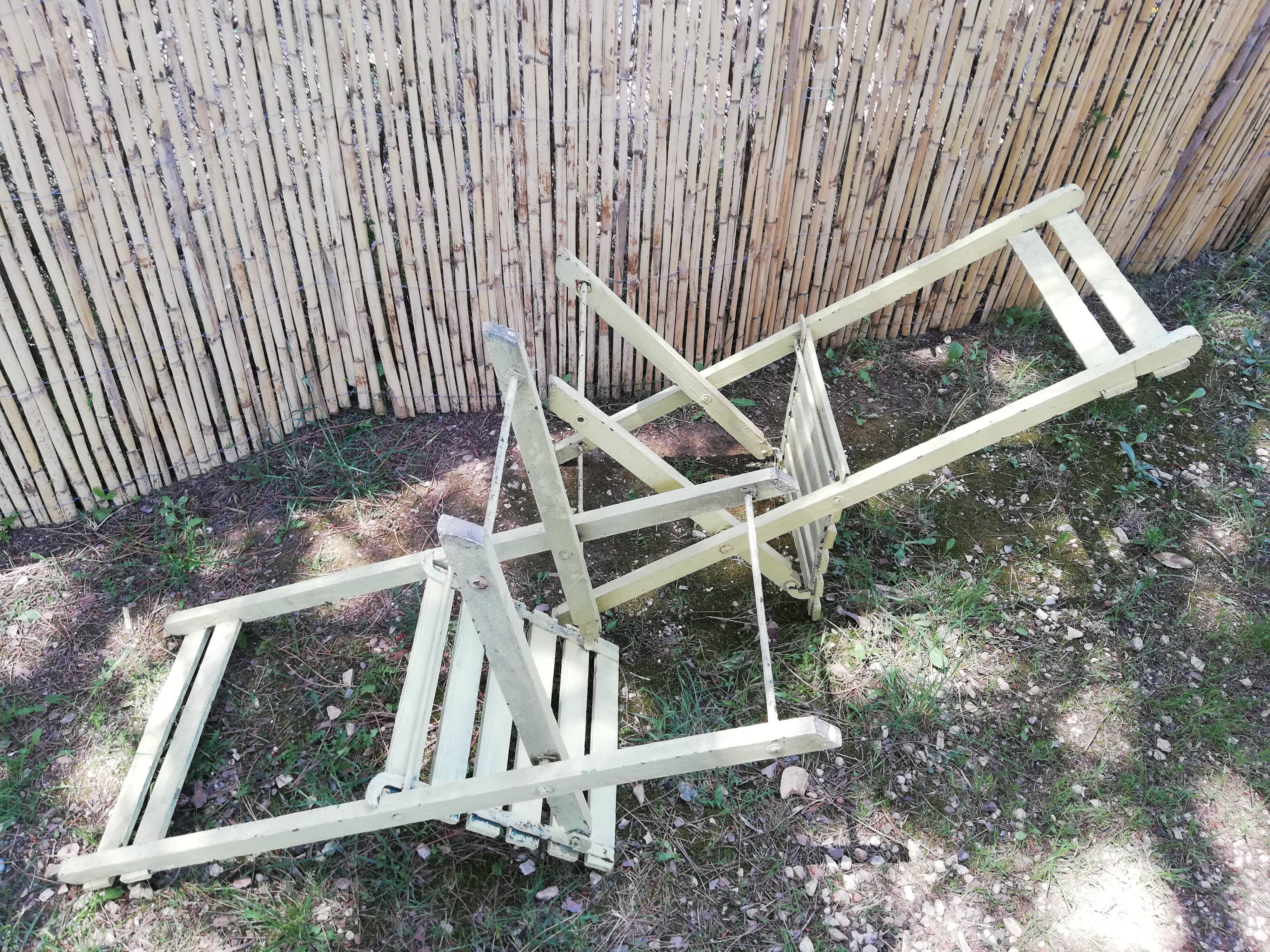 Two folding garden chairs