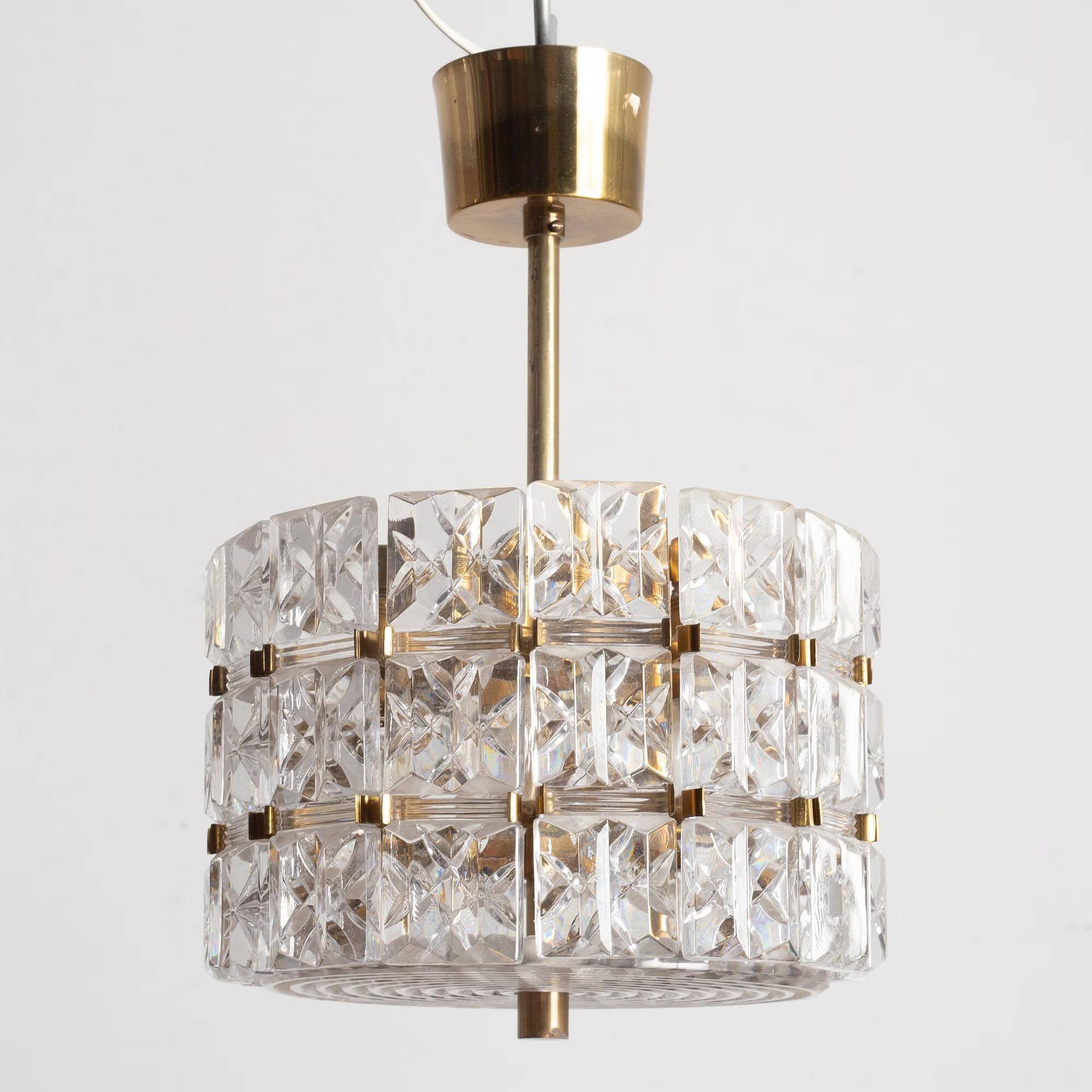 Suspended glass and brass lamp by Carl Fagerlund for Orrefors, Sweden, 1960.