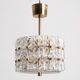 Suspended glass and brass lamp by Carl Fagerlund for Orrefors, Sweden, 1960.