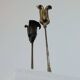 Pair of vintage brass candle holders with tulip decoration.