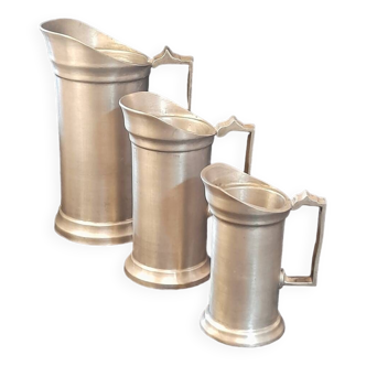 Set of 3 pewter pitchers 95%