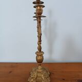 Bronze candlestick with lion head decoration