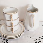 Set of 3 white and gold bistro coffee cups and coffee pot, in porcelain