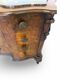 serpentine commode in antique walnut