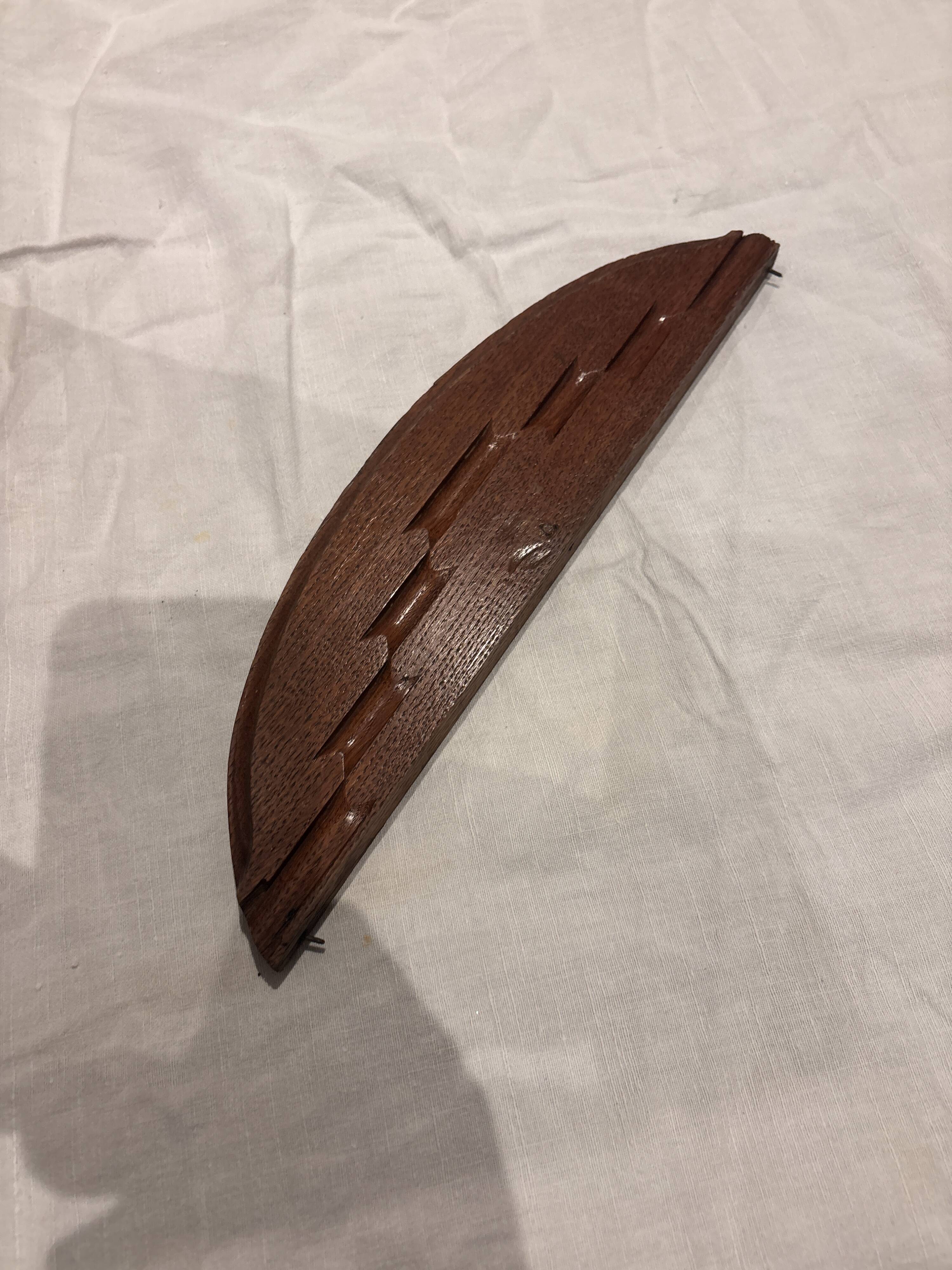 Wall cabinet with oval wall and drawer