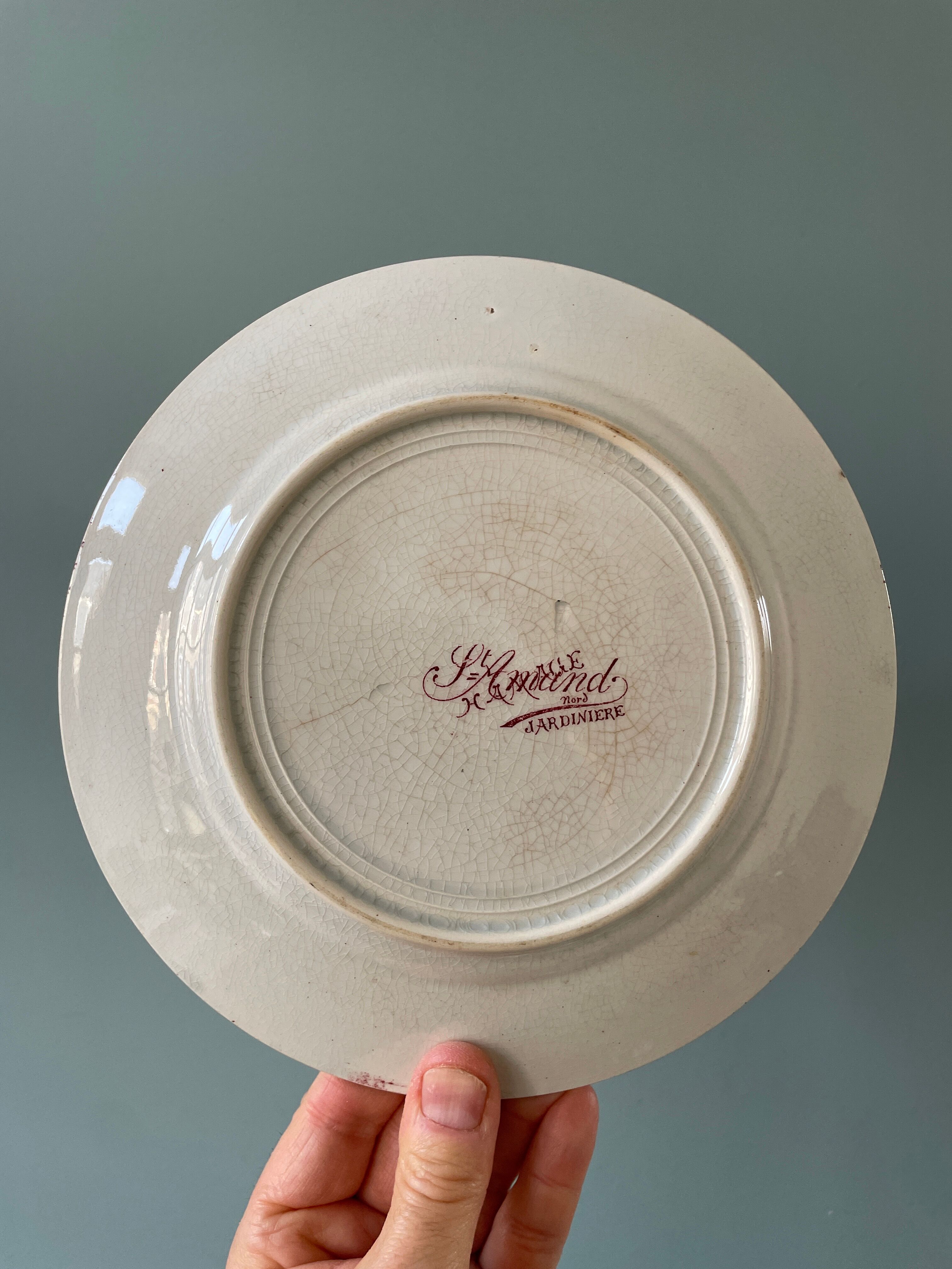 Series of 12 mismatched Terre de Fer dessert plates