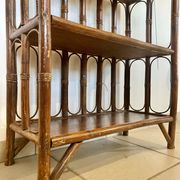 Shelf on rattan and bamboo legs from the 70s
