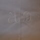 Tablecloth and 11 cotton/linen towels embroidered AD circa 1900
