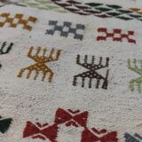 Handmade rugs in natural wool with traditional patterns