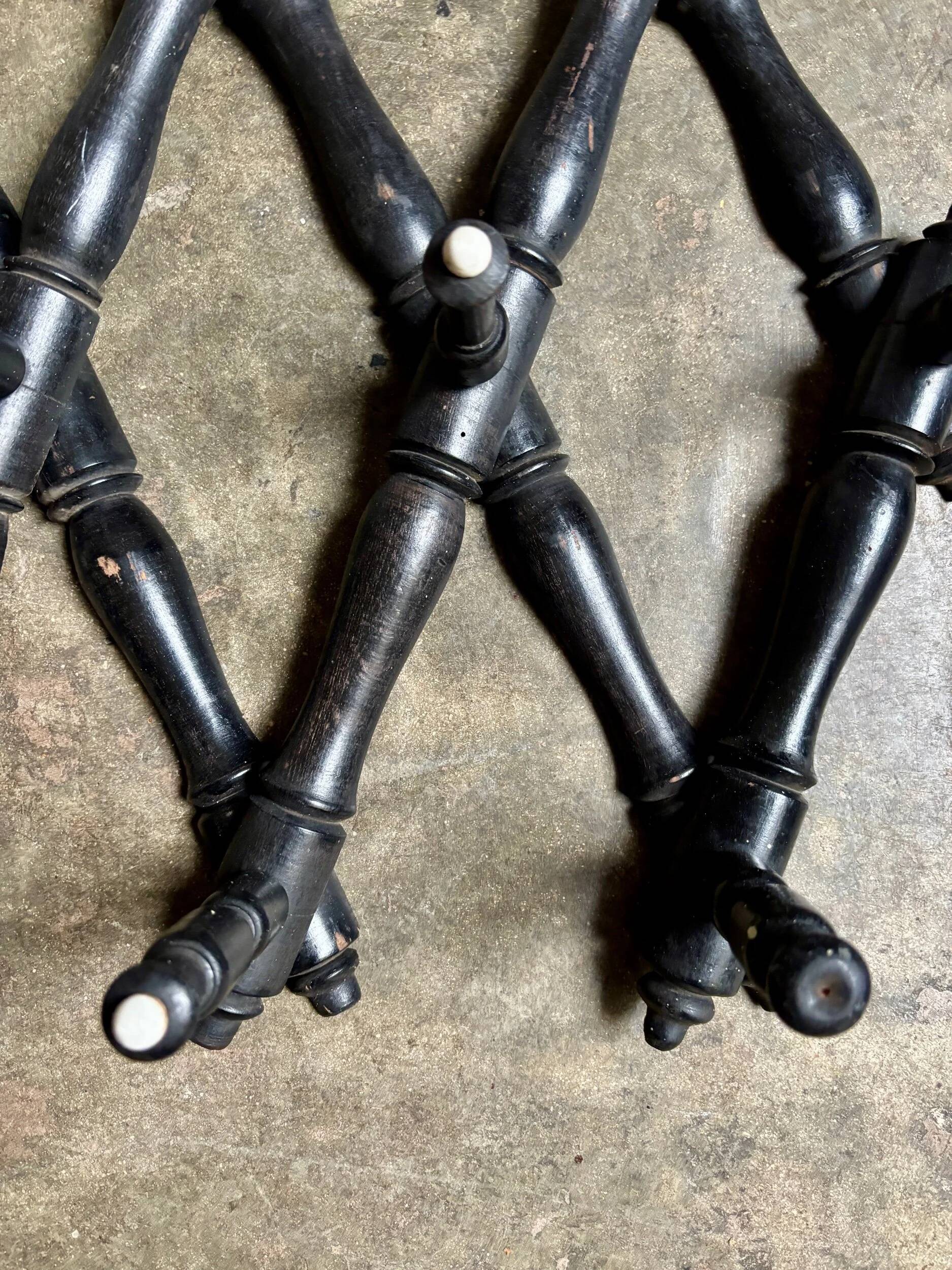 Napoleon III hinged wall-mounted coat rack in black wood