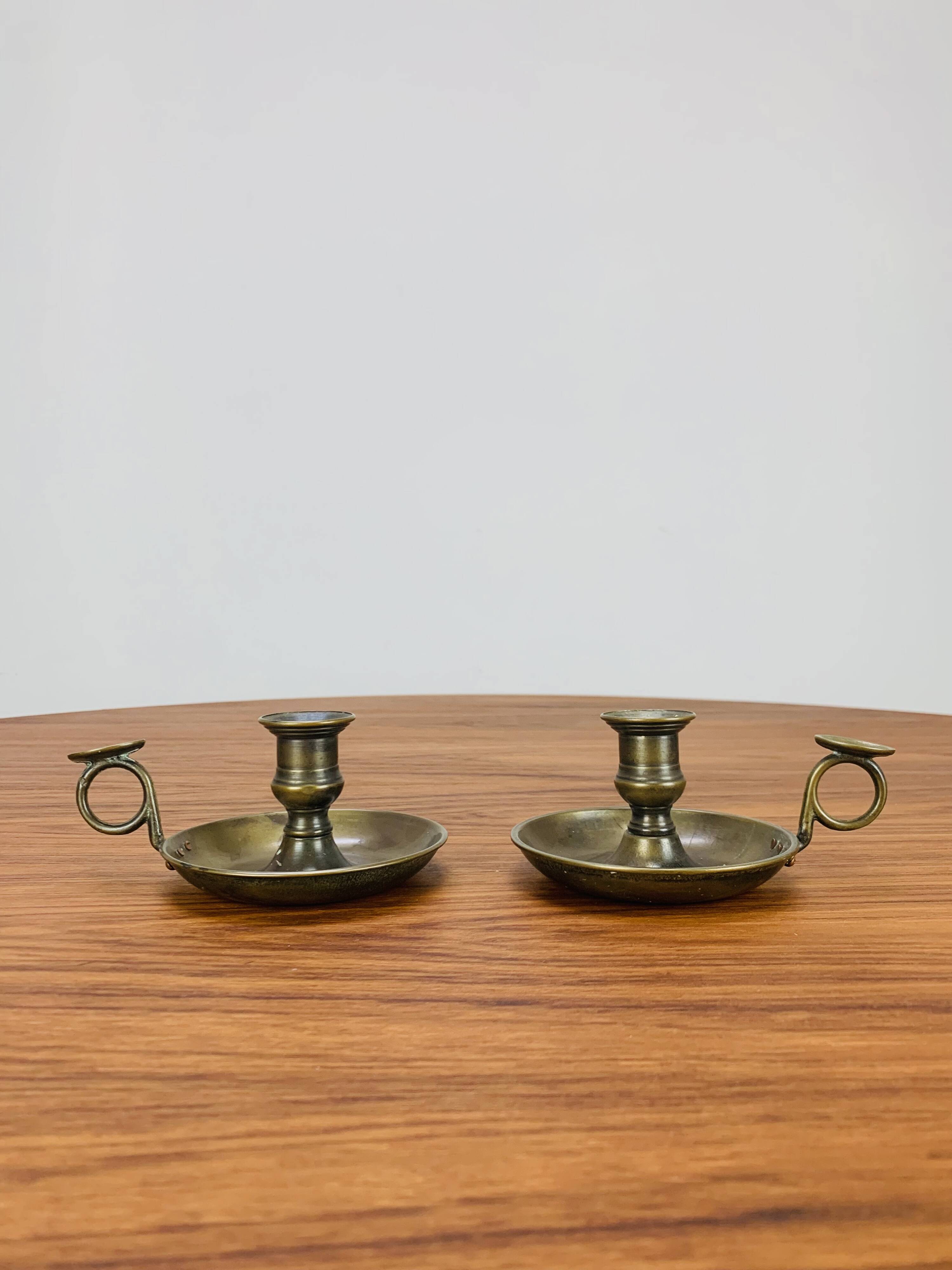 Pair of vintage brass cellar rat candlesticks