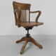 Oak office chair with spring mechanism and armrests