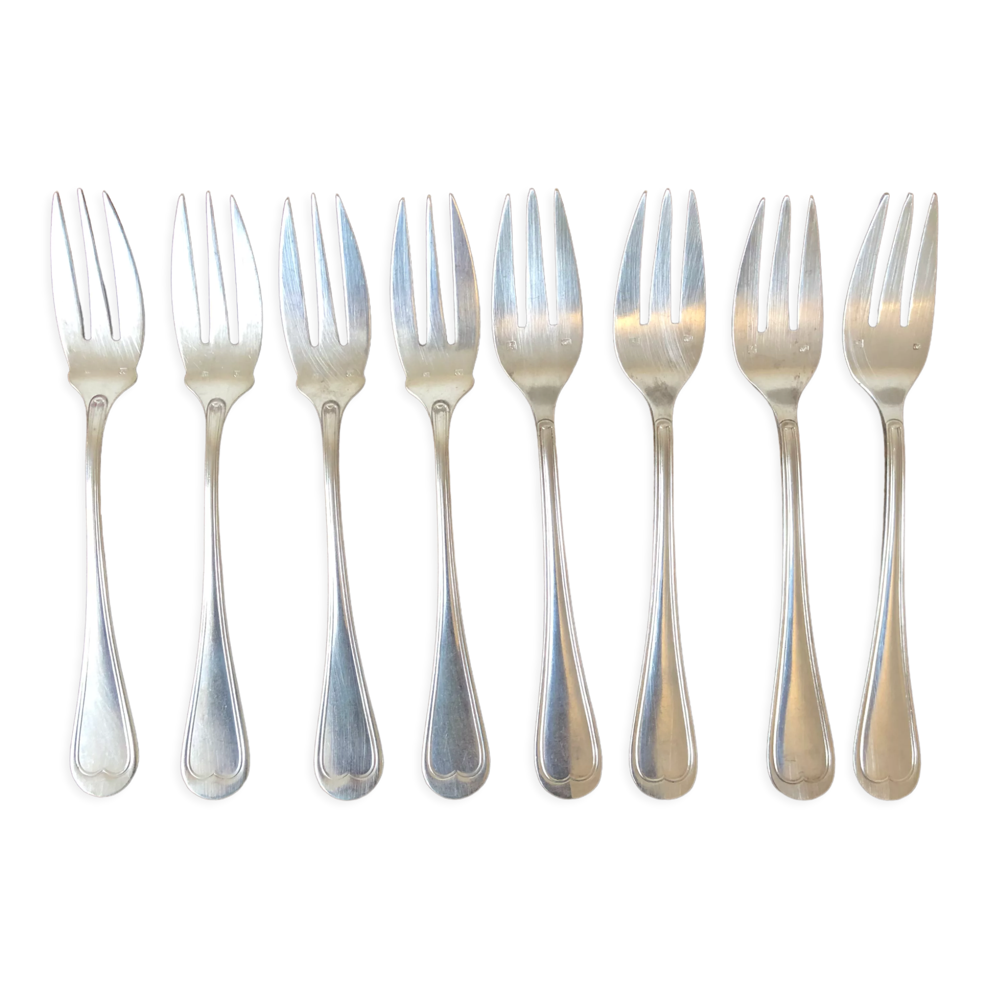 8 mismatched fish forks, silver metal