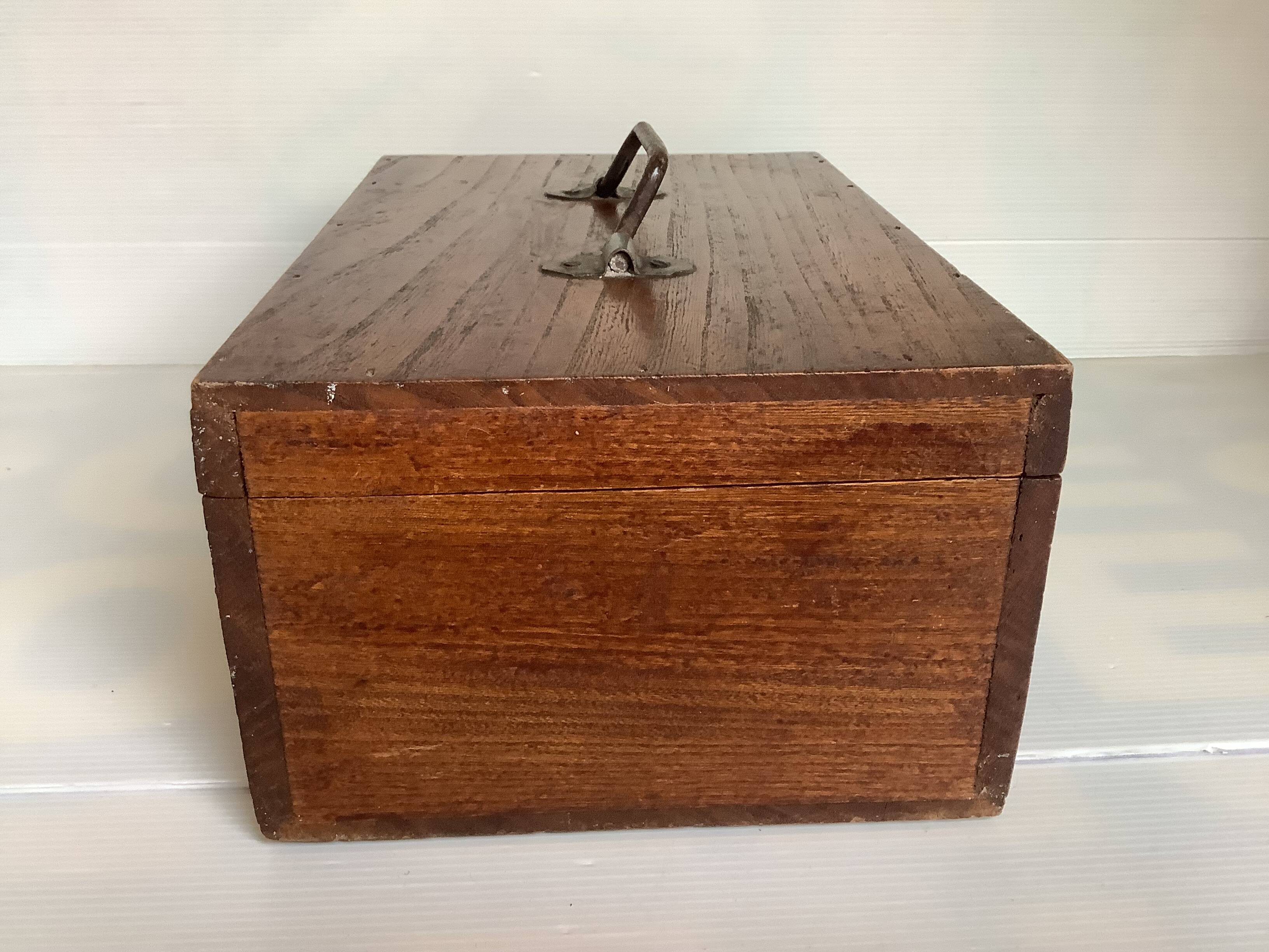 Old wooden box with handle