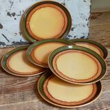 Six vintage stoneware plates with green net