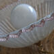 Large vintage Murano suspension in textured glass with a pink edge.