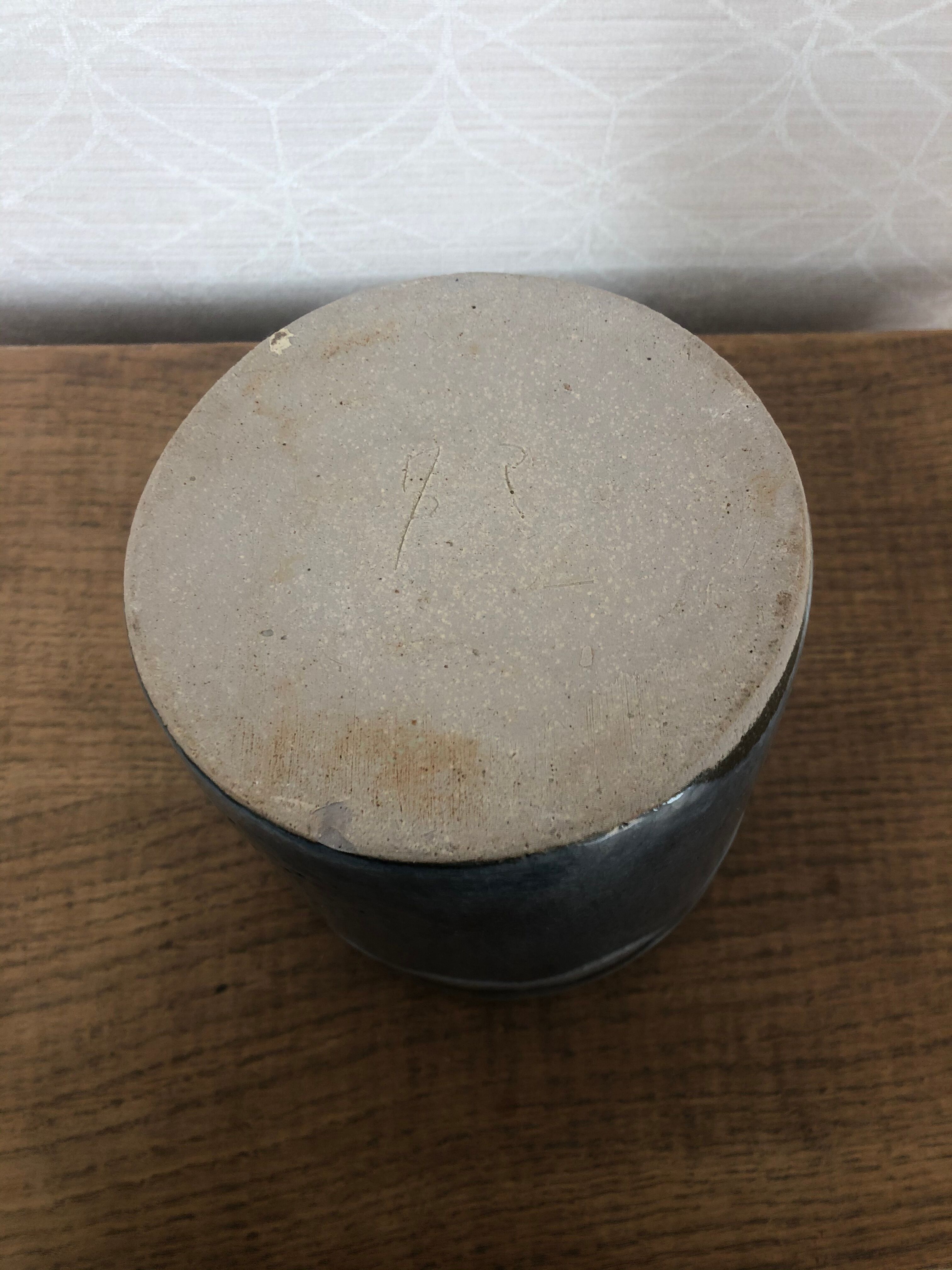 Vintage blue vase in varnished sandstone