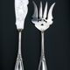 Fish Serving Cutlery: Fork + Knife/Shovel. Silver-plated metal.
