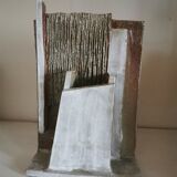 Architecture vase in raw sandstone