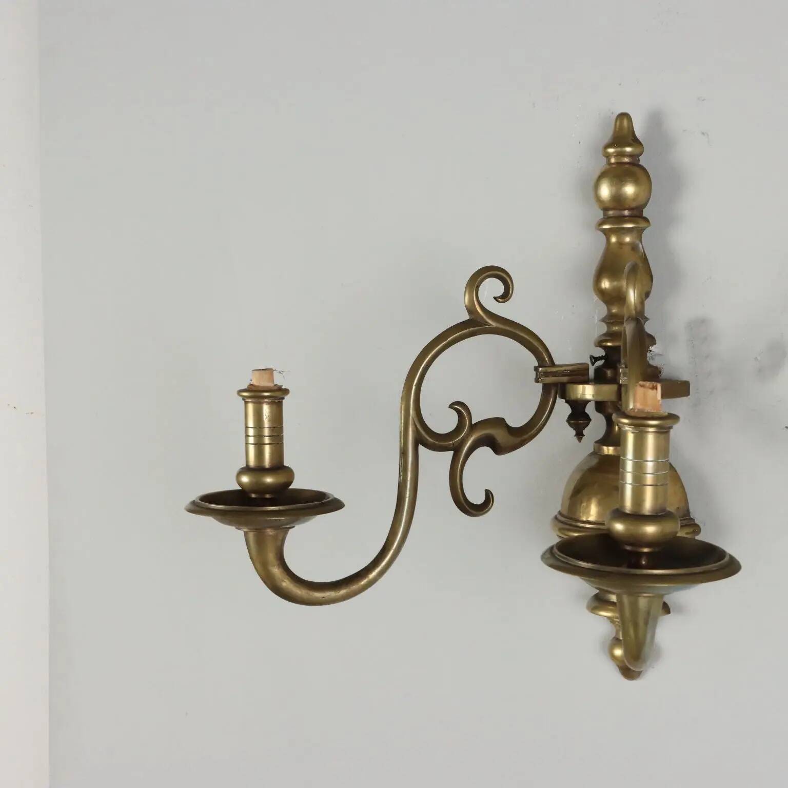 Pair of antique wall sconces in 20th-century Baroque style.