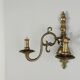 Pair of antique wall sconces in 20th-century Baroque style.