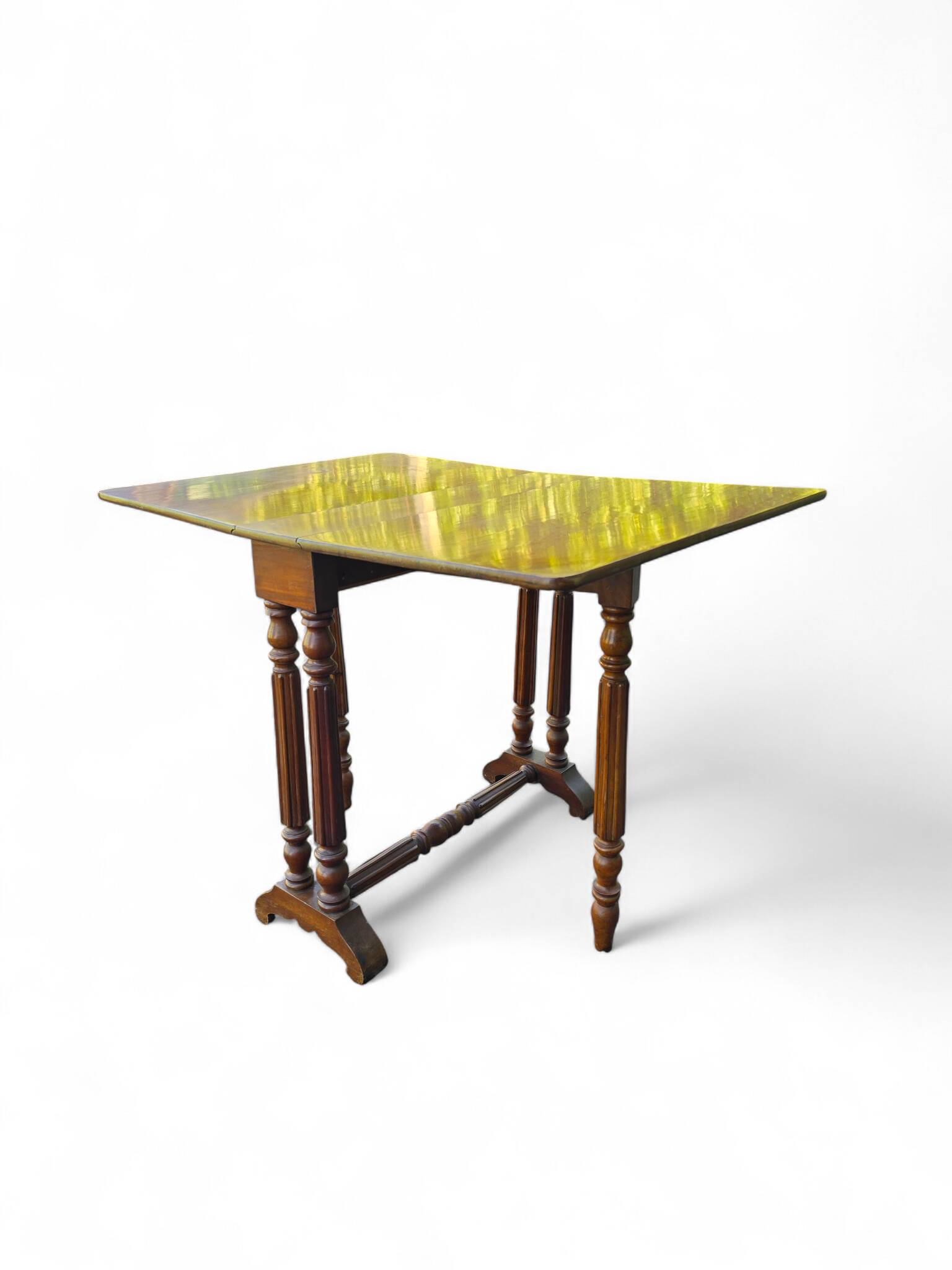 “Gateleg” folding walnut table