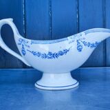 Old earthenware sauce boat