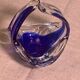Ashtray in transparent and blue blown glass with a design shape