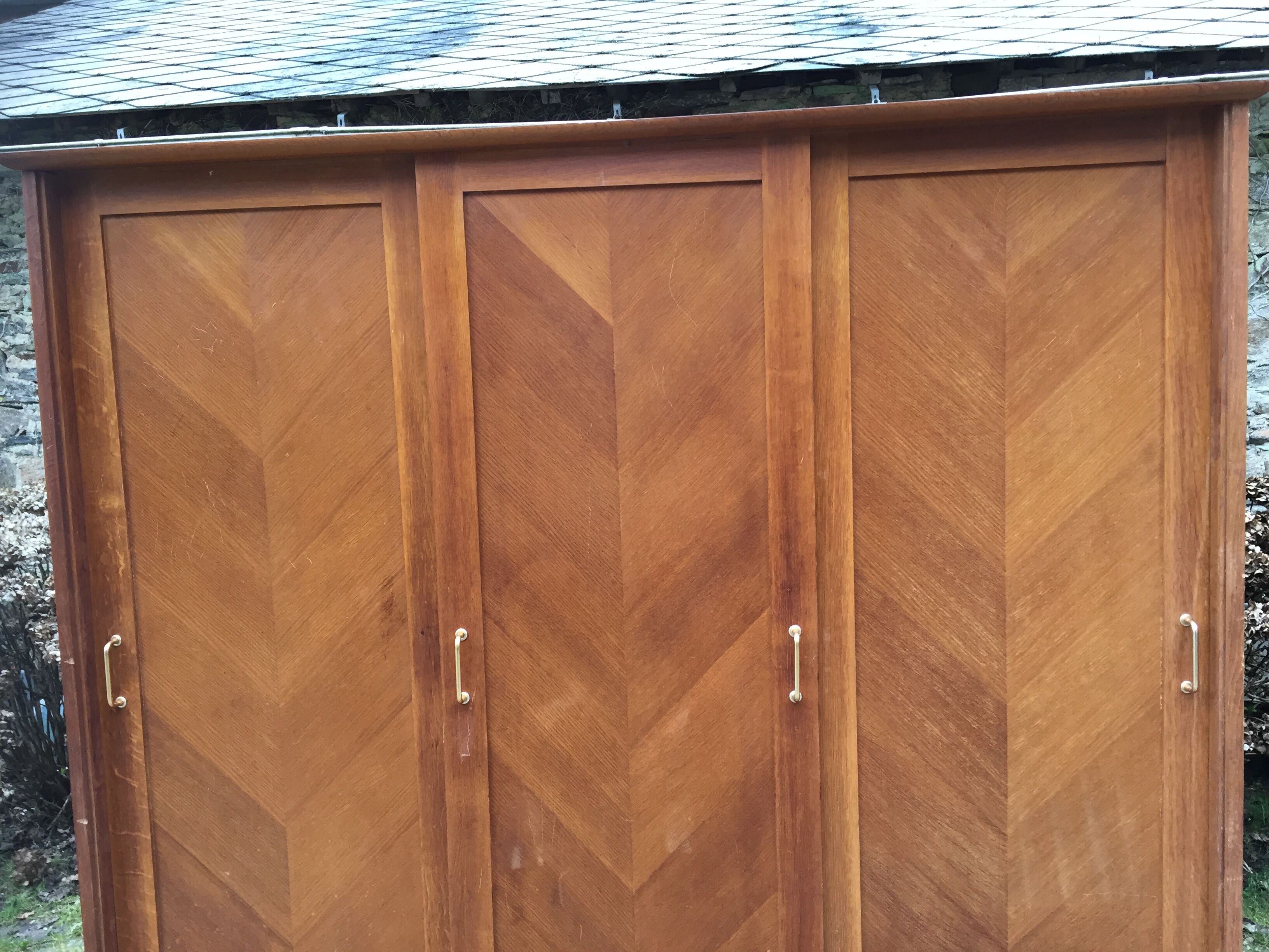 Vintage wardrobe compass feet with 3 sliding oak doors.