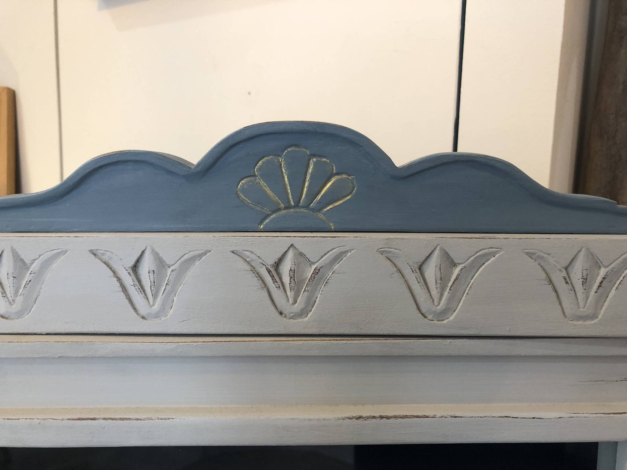 Blue wooden bookshelf