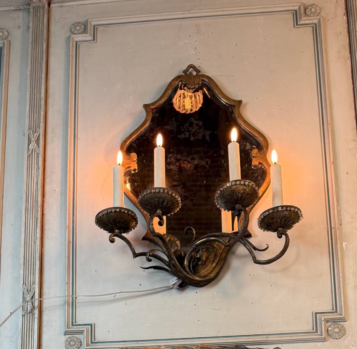 Gold metal wall mirror, in the style of Maison Baguès, Paris circa 1950.