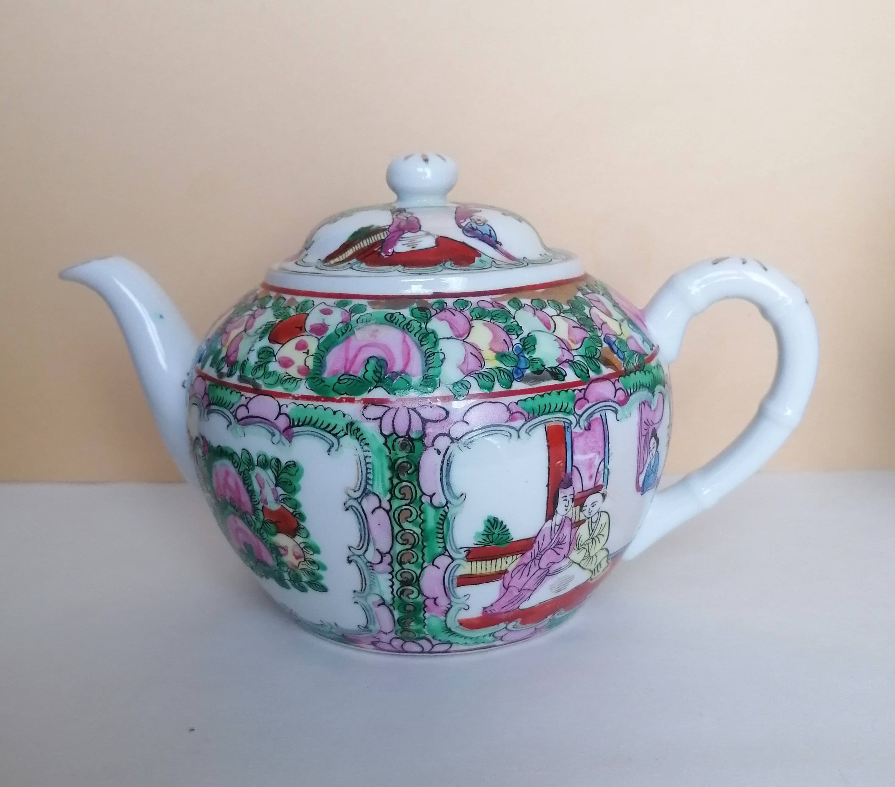 Canton porcelain tea service with 6 cups and teapot.