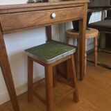 Wooden stool and green seat
