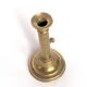 Brass candlestick with a column and bobeche.