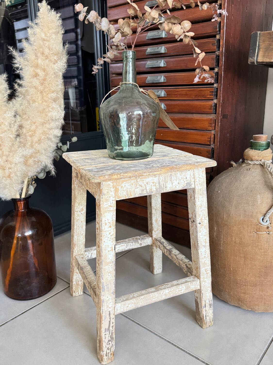 Old wooden stool with square seat