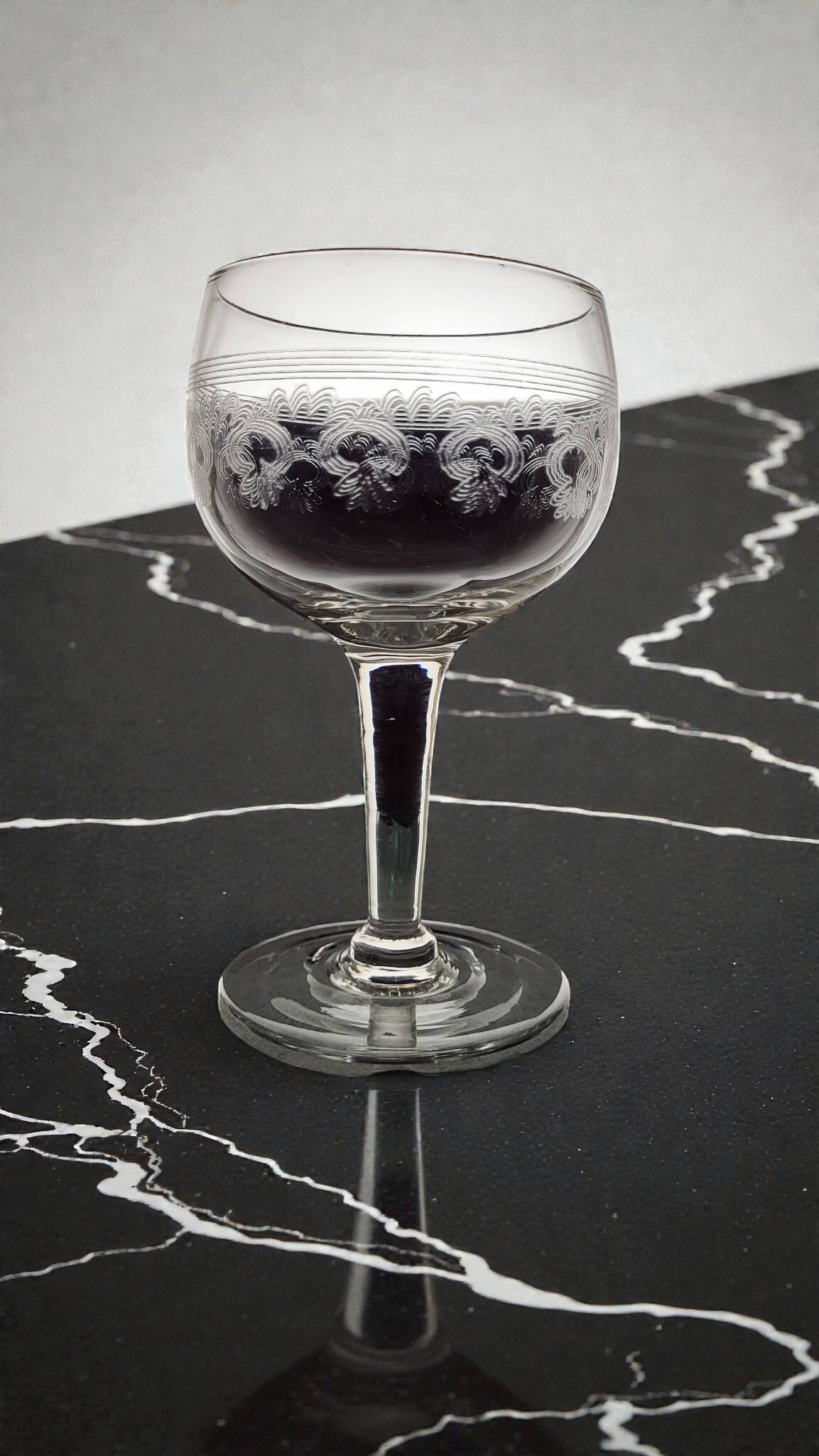 Page 4 of 8 9 guilloché wine glasses, early 20th century