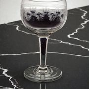 9 guilloché wine glasses, early 20th century.