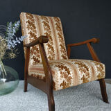 Floral-patterned velvet armchair