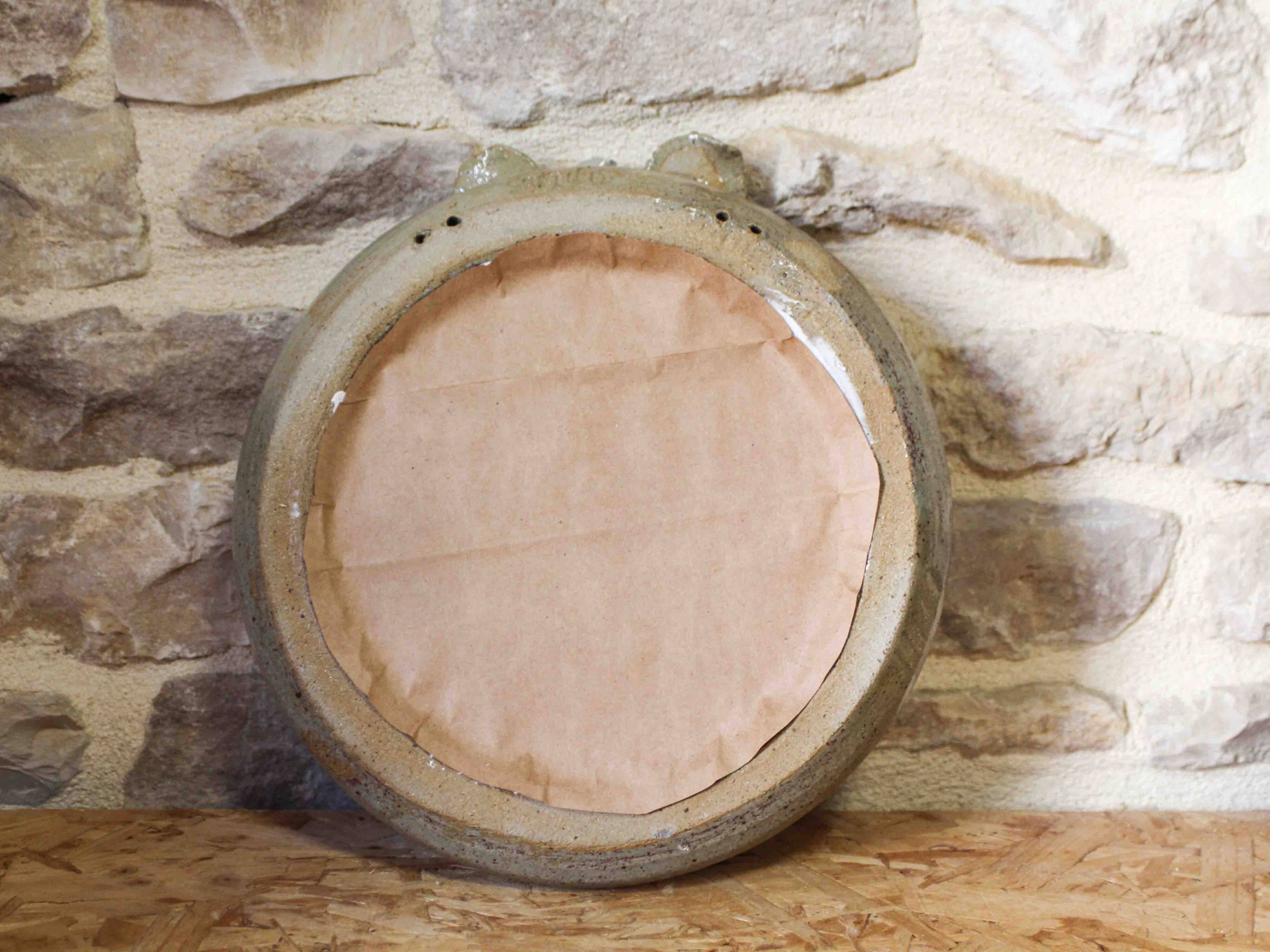 Round ceramic mirror with flower decoration by Catido