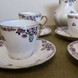 18-piece porcelain coffee set signed "Aux Lions de Faïence Paris"