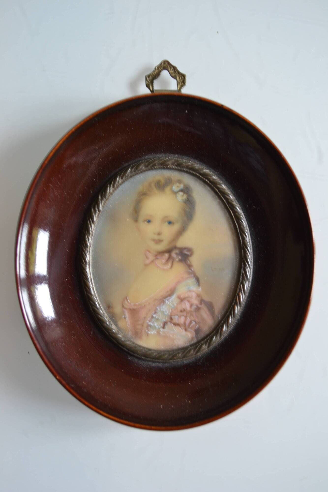 Miniature portrait of a young girl, framed and under glass