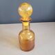Amber molded glass carafe with stopper
