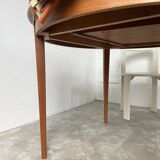 Scandinavian round teak table with extension